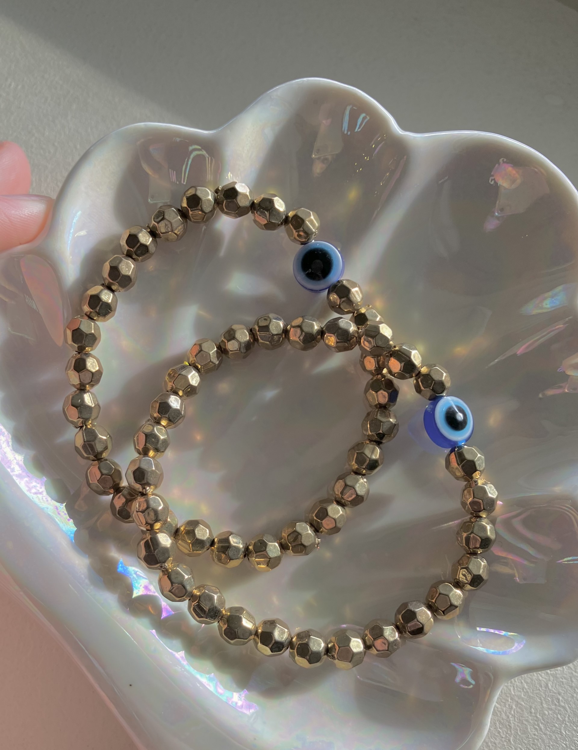 gold beads with blue eyeball bracelet | handmade